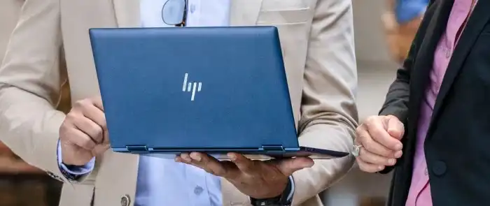 holding-laptop