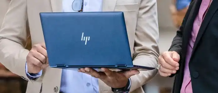 holding-laptop